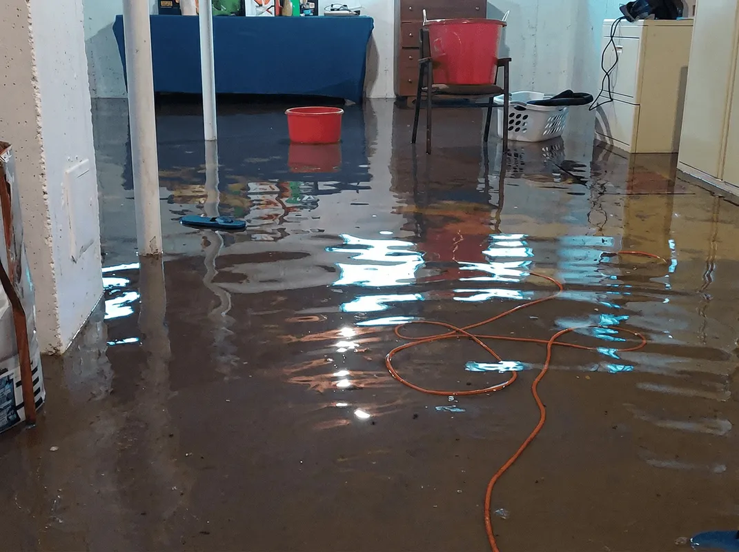 Basement with boiler, cabinets and washing machine completely flooded in Albany, NY